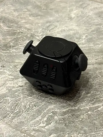 Black fidget toy