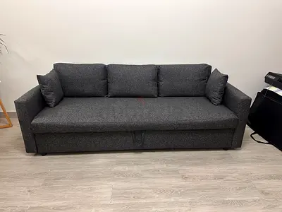 IKEA Friheten three seater sofa bed under storage