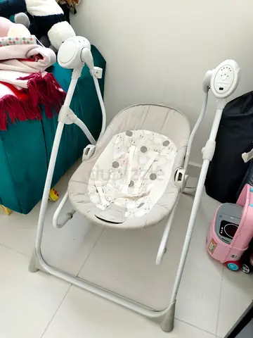 Gentle Rocking Baby Swing for Sale - Cozy and Safe!