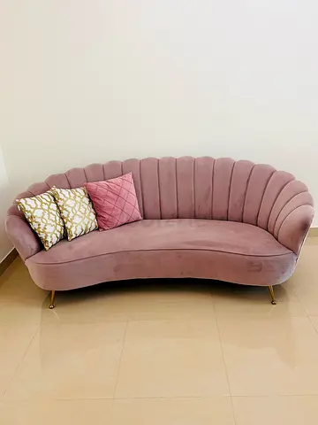 Chic Pink Curved Sofa - Perfect for Modern Living Spaces! home centre urgent sale