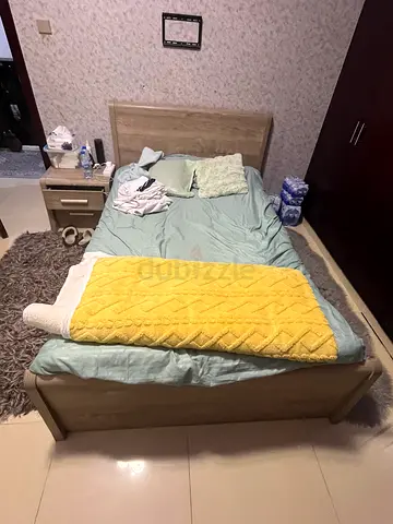 Cozy and Stylish Bed with Nightstand