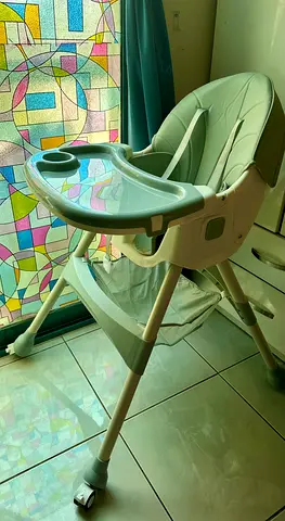 Elegant and Versatile Baby High Chair for Easy Feeding!