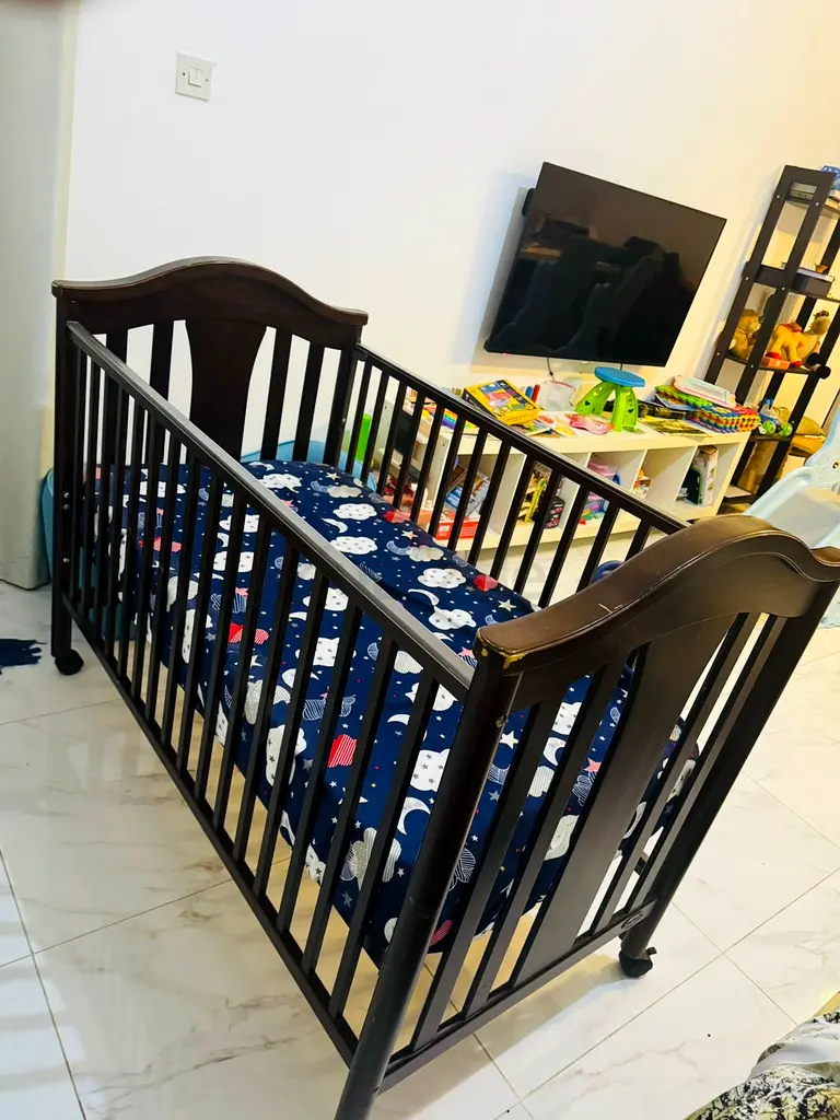 Juniors/Babyshop wooden crib with mattress for sale dubizzle