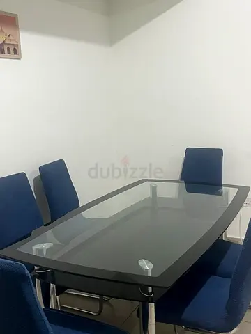 Glass table with the 6 with chairs
