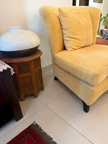 Chic and Cozy Vintage Armchair with Ottoman