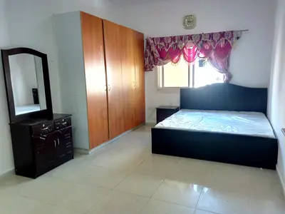 Room with attached washroom available for vegetarian couple near baqer mohibi Al nahda sharjah
