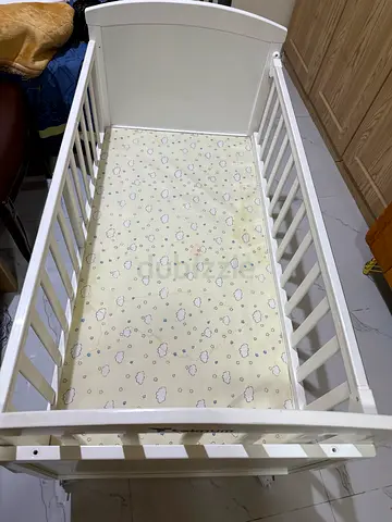 Charming White Baby Crib for Sale
