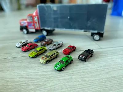 Massive Collection of Diecast Toy Cars with Truck