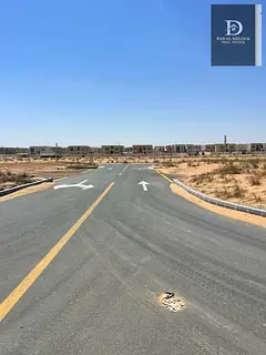 For sale in Sharjah, Rawdat Al Qurt area, residential land Area 3,110 feet, corner plot on two stree