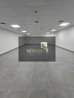 Office for annual rent in Rashidiya 1 – strategic location near Ramada Black Hotel, 943 sq ft, inc