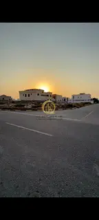For sale: a plot of land in the Emirate of Sharjah, Al-Houshi area, Al-Badi neighborhood, in a very