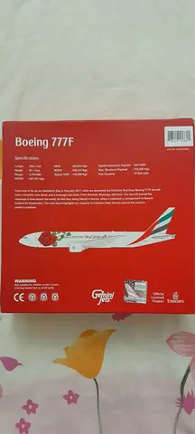 Emirates airplane boing 777F with roses
