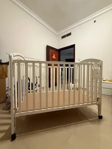 Elegant White Crib for Your Little One