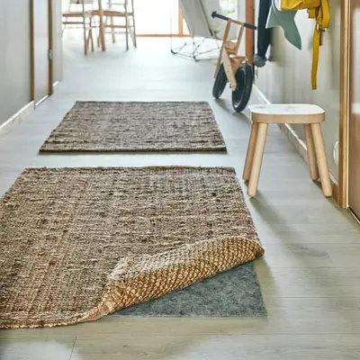 TWO JUTE RUGS AT 500 FREE DELIVERY . SERIOUS BUYERS