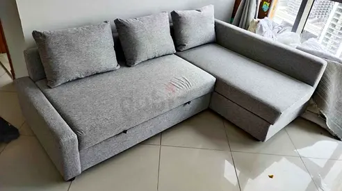 Ikea L shape sofa com bed with storage