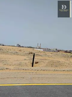 For sale in Sharjah, Al Matraq area, a residential land with an area of3616feet, ground floor and tw