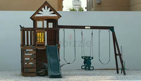 Brand New Sturdy Wooden Playhouse with Slide and Swings