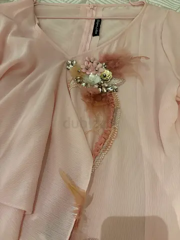 Elegant Pink Dress with Floral Embellishments