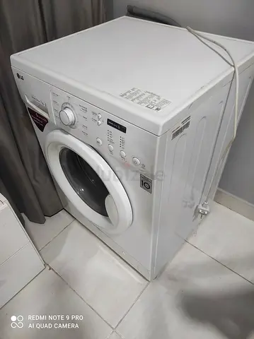 LG Front Load Washing Machine - Clean and Efficient Laundry Solution!