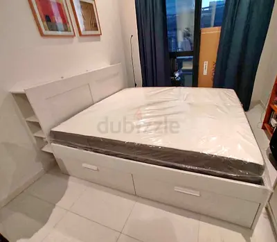 IKEA brimness queen size bed with 4 storage drawers underneath and with  IKEA mattress