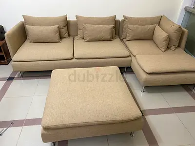 IKEA Söderhamn L-shaped sofa with ottoman