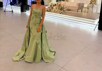 Elegant Green Evening Gown with Floral Accents