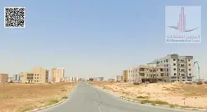 Land for sale in Ajman, Al Alia Global area. Residential/commercial permit. Ground floor + 6 garages