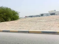 Land for sale in Al Sajaa Al Hanoo Al Qadeem area, corner location, prime location