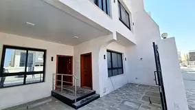 Central air conditioning included - Own a villa in Al Alia area, ground floor and first floor + roof