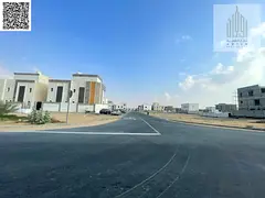CORNER Residential investment land with villas in Ajman, Al Tilla 2 area. The land covers an area of