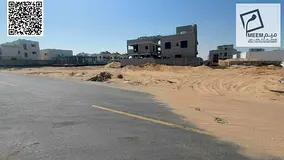 Land for sale in Ajman, Al Amrah Garden, including registration fees, freehold ownership for all nat