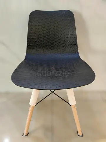 Stylish Black Dining Chair with Unique Texture
