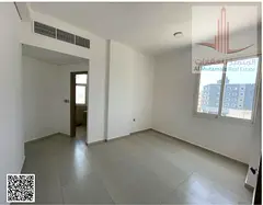 For sale in Ajman, a residential/commercial building in Al Rawda 2 area, with a land area of ​​+
