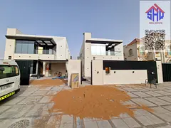 Villa for sale with waterfall and garden, including central air conditioning, five bedrooms, majlis,