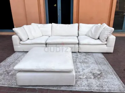 Elegant White Sectional Sofa with Ottoman