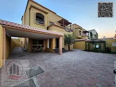 Villa for sale in Ajman, Al Muwaihat. 5 master bedrooms, majlis, 2 living rooms, and maid's room