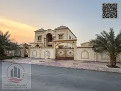 Villa for sale in Ajman, Al Rawda area. 7 master bedrooms, majlis, 2 living rooms, and a maid's 