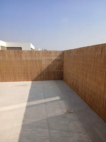 Iranian bamboo fence on glass panel