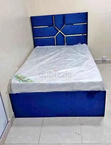 Elegant Blue Upholstered Bed with Storage