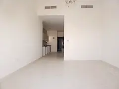 Brand new building in Al jada out side studio apartment available with balcony big apartment