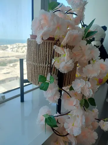 2 Nos. Charming Artificial Flower Arrangement in Woven Pots