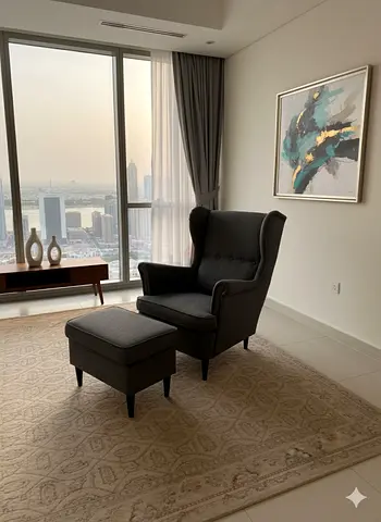 IKEA STRANDMON Armchair and footstool dark grey