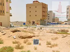 Residential and commercial land for sale in Al Alia, Ajman – prime location on a road and service 