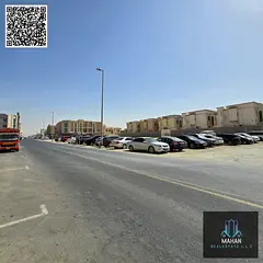 Residential + Commercial Corner Plot in a Prestigious Location – Rawda 2, Ajman | G+2 Building Per