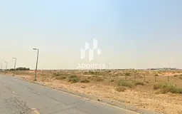 Commercial plot for sale in Al Dabdaba, North Al Rahmaniya, Sharjah – prime location near Ajman wi