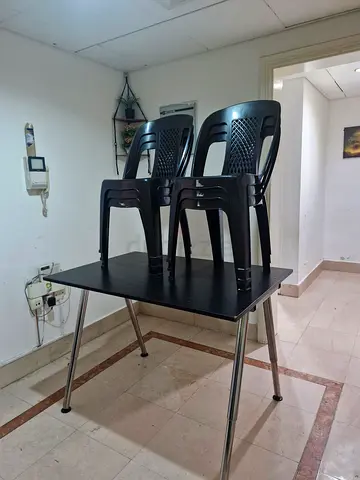 Sturdy Dining Table with Stackable Chairs