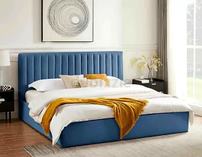 Elegant Blue Upholstered Bed with Modern Design