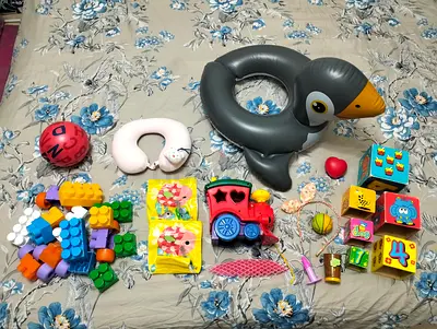 All for 30 AED Toys, building blocks, travel pillow, swimming accessories for kids in perfect condit