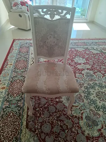 Elegant Upholstered Dining Chair with Intricate Design