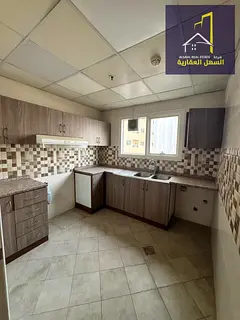 Spacious two-bedroom apartment for rent in Al Qasba, prime location with parking